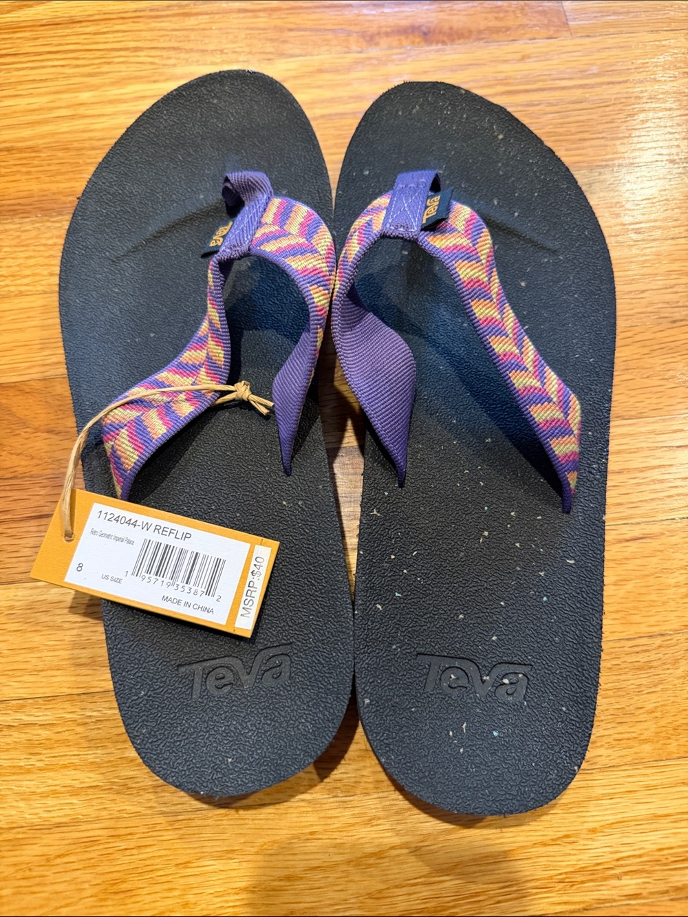 Teva Women’s Black Flip Flops with Purple Multi-Patterned Straps